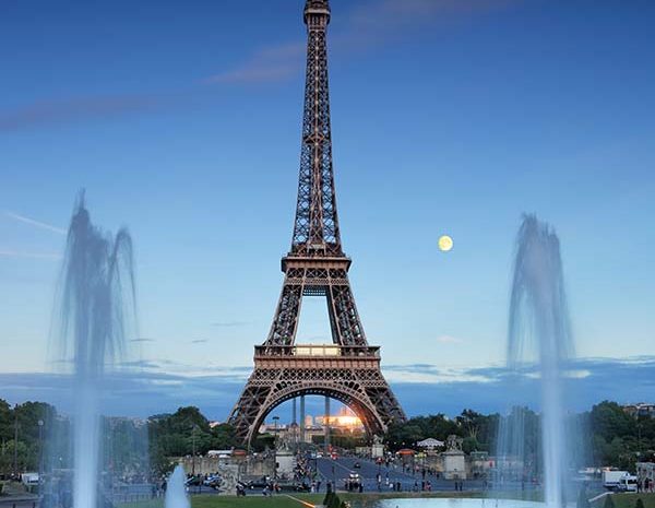 "Trocadero fountains seen at evening in Paris, France."